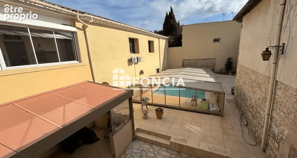 LUNEL CENTRE-VILLE Maison de Ville de 260 m2 avec Garage, cour et Piscine - photo 16