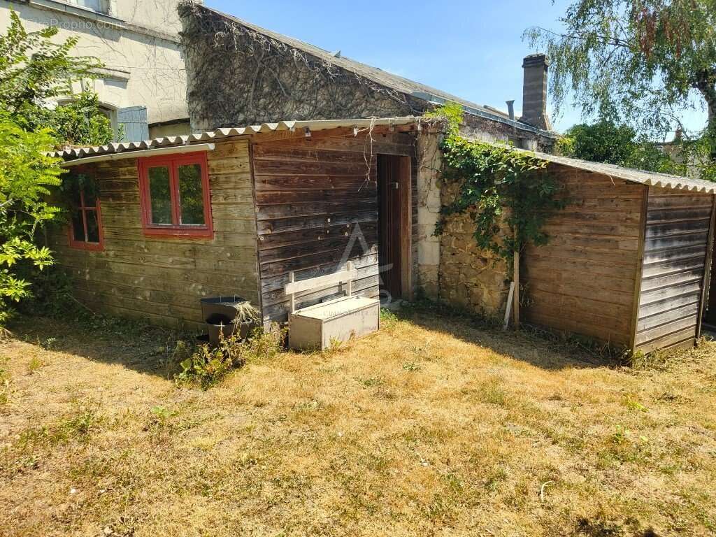 Authentique maison de charme avec jardin et dépendances à MONTREUIL-SUR-LOIR - photo 13