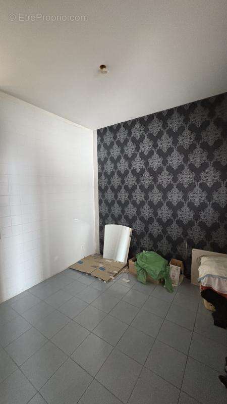 Opportunité à Saisir à Commentry (03) : Immeuble Mixte - Local Commercial + Habitation à l'Étage - photo 19
