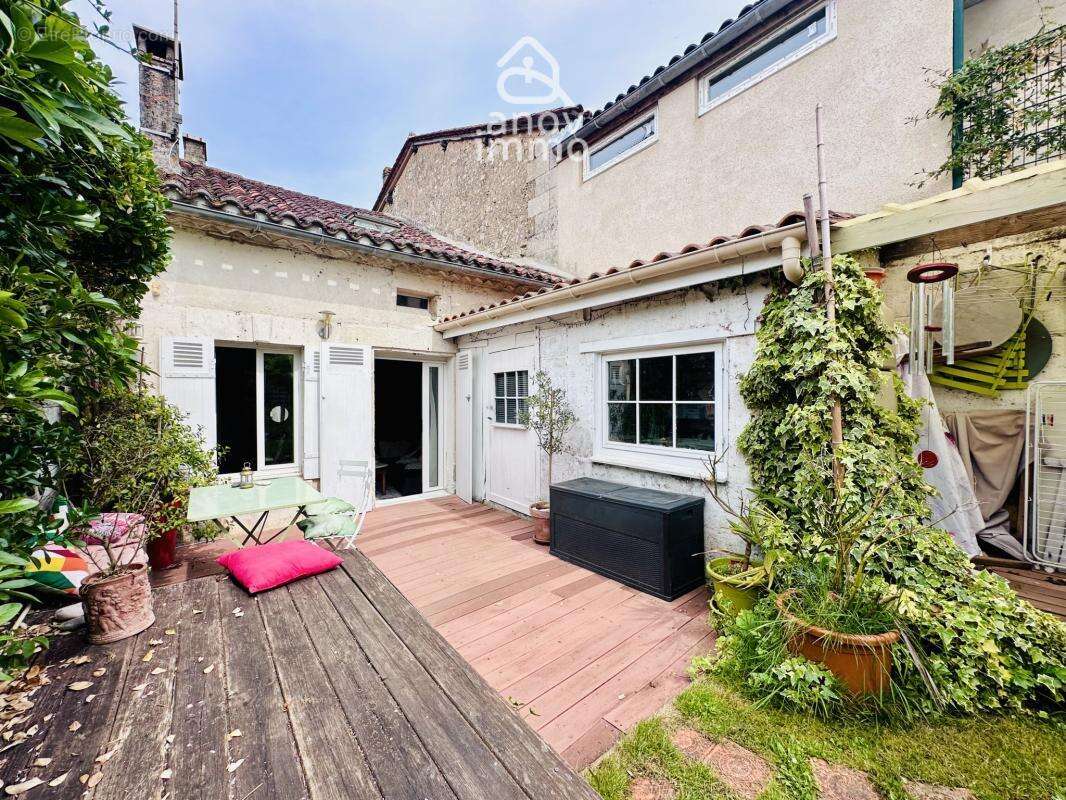 Maison de charme avec jardin intime, terrasse et atelier   E - photo 18