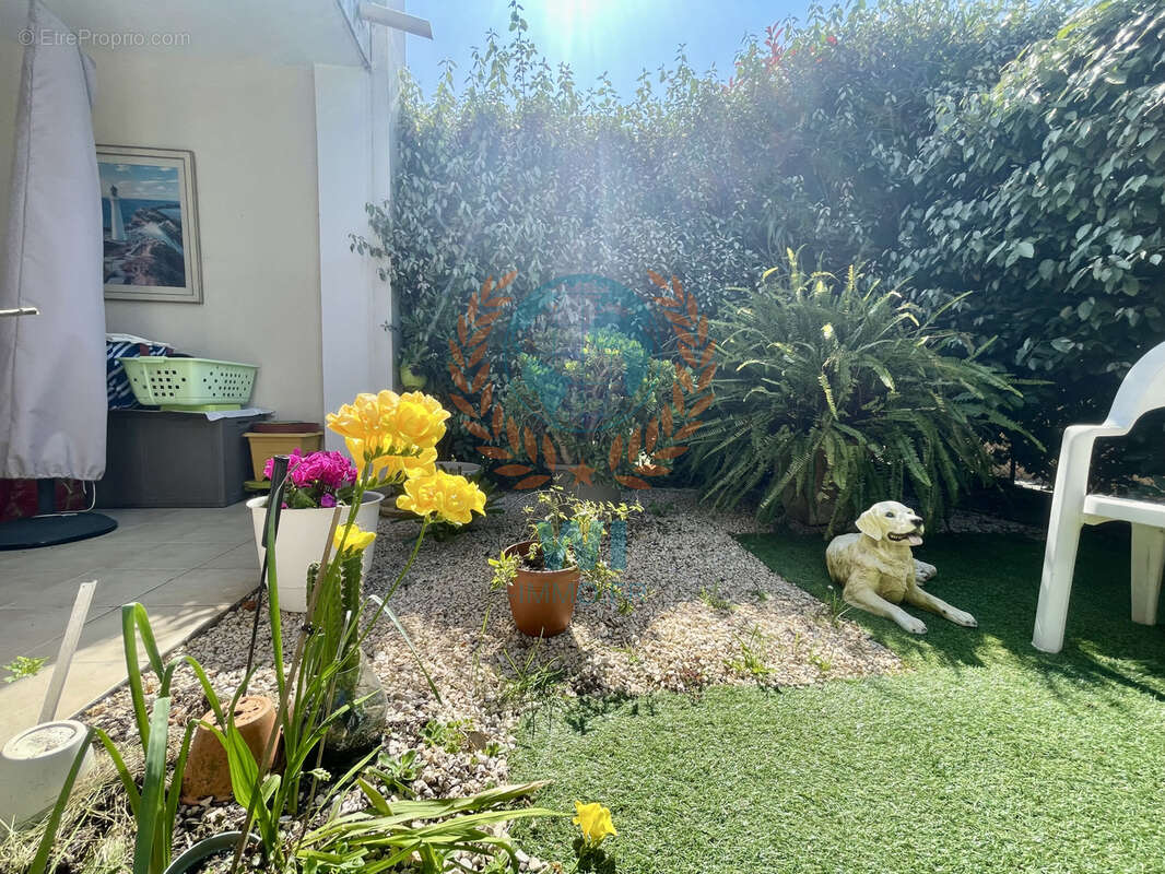 Appartement  en rez-de-jardin avec piscine et garage - photo 10