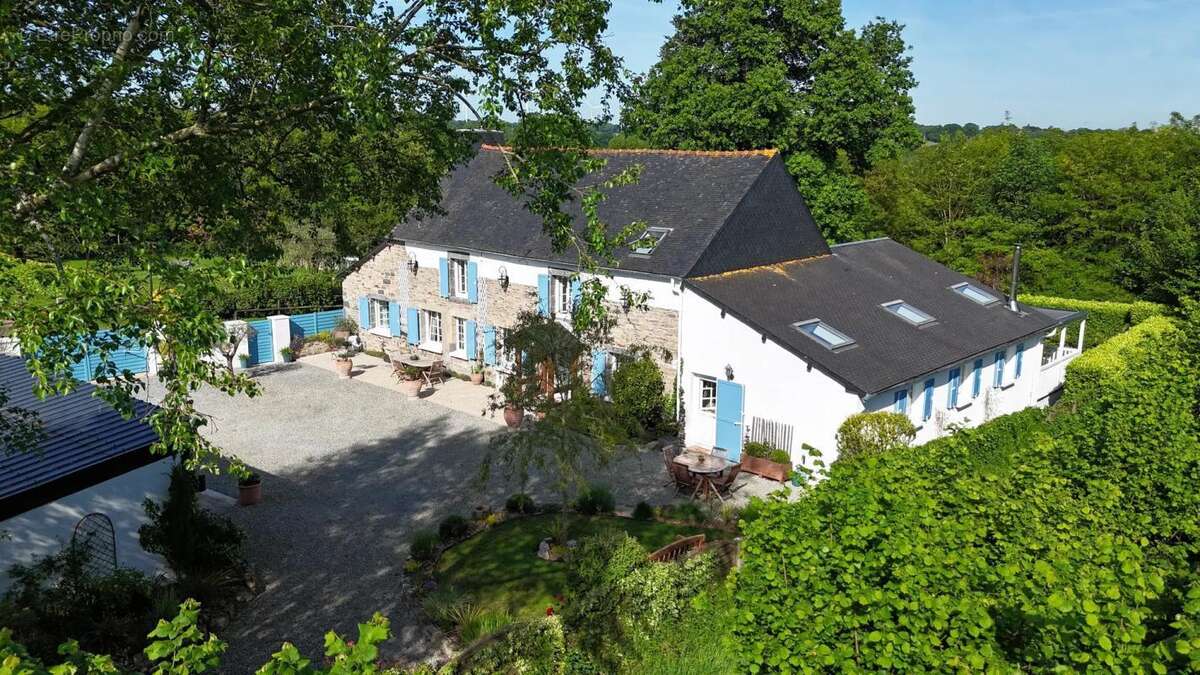 Maison de 7 pièces de 235 m² à Le Mené - photo 2