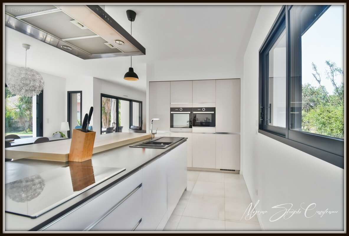 Maison d'architecte à vendre 6 pièces  (40) de 168 m² avec appartement indépendant - photo 3