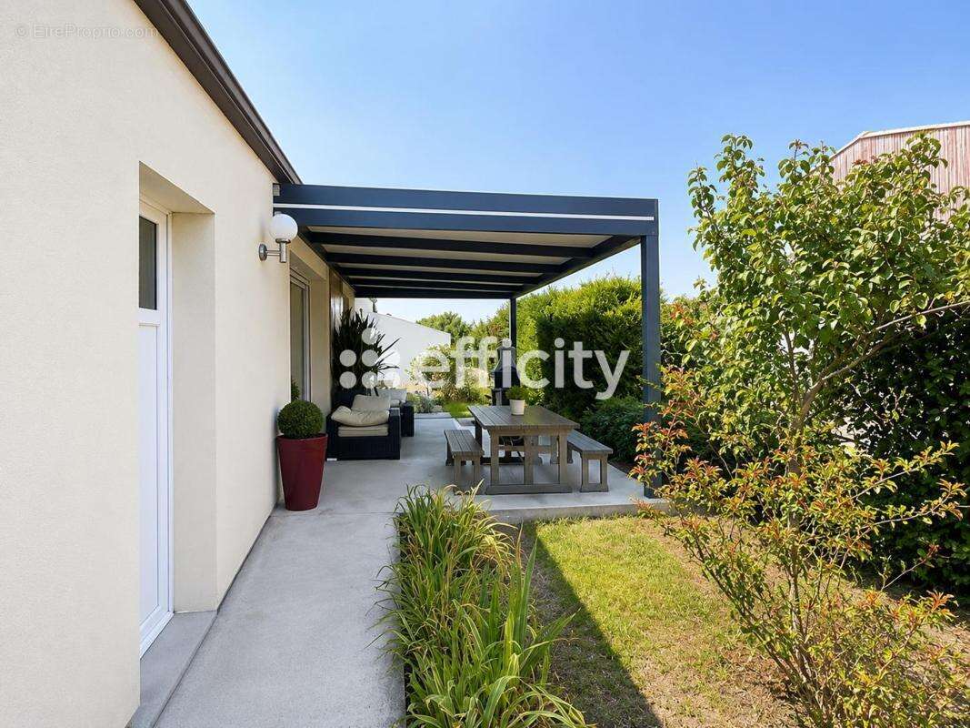 Maison 108 m² à Semussac  - photo 19