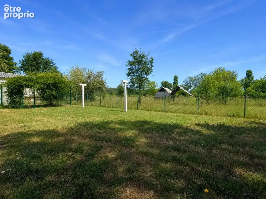 Maison de plain-pied de 115 m² avec garage et jardin - photo 16