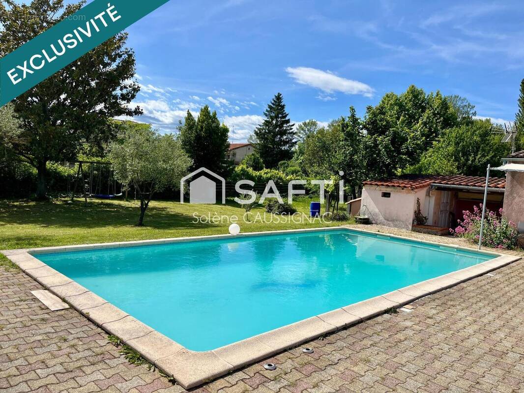 Photo 1 - Maison à SAINT-JULIEN-LES-ROSIERS