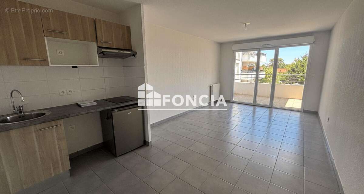 Appartement t2 avec terrasse et parking sous- sol - photo 4