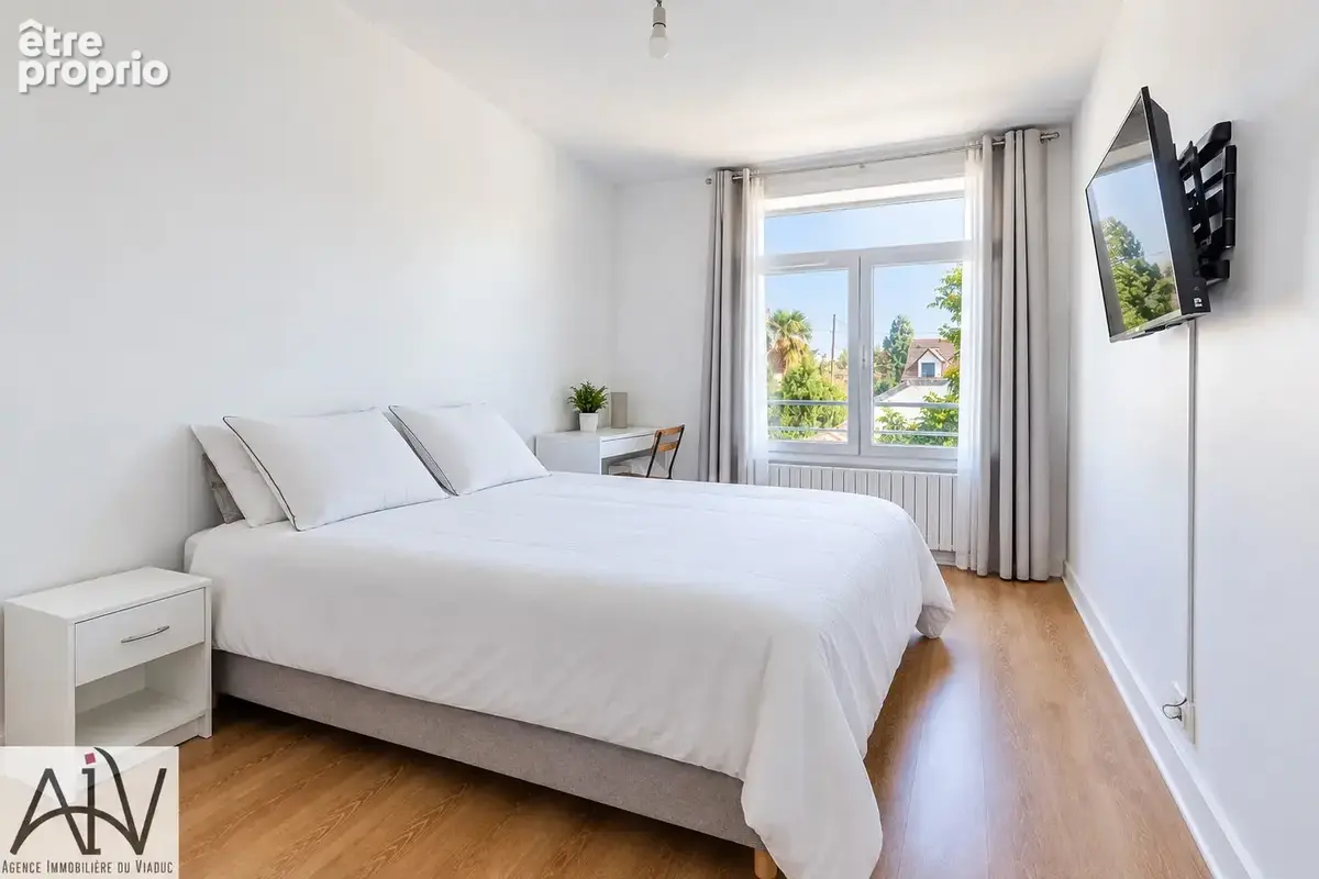 Appartement 5 pièces de 82 m2 avec trois chambres, box et cave - photo 7