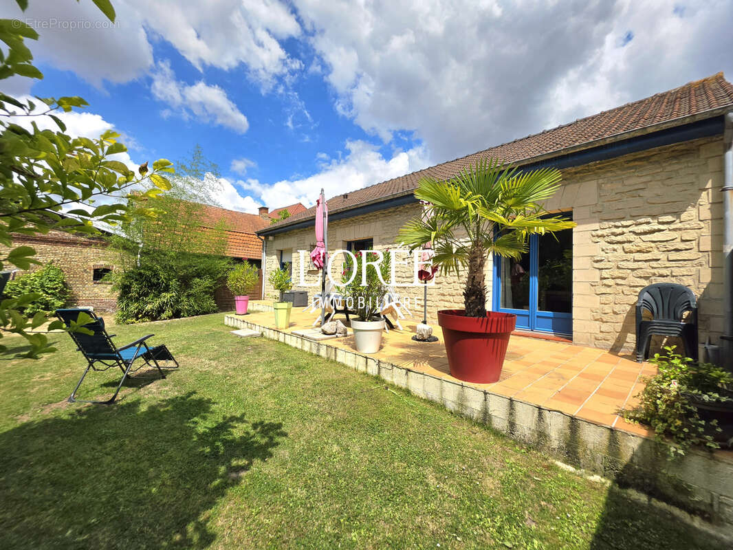 Plain pied individuel - 3 chambres - jardin - sous sol semi complet - photo 3