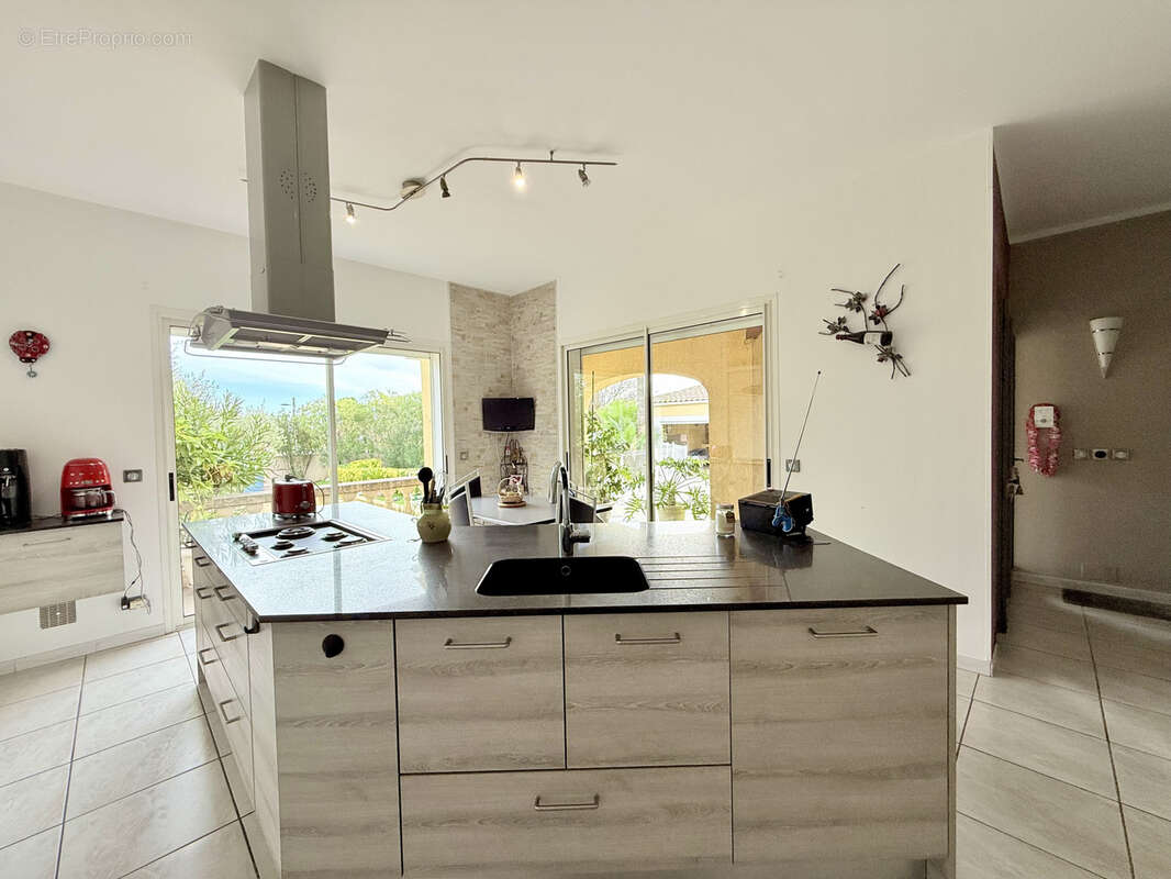 PIGNAN maison T6 avec piscine et sous sol - photo 3