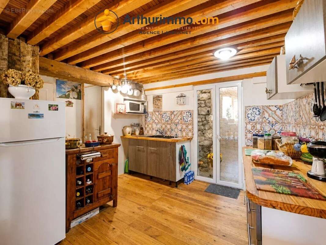 Maison de caractere en pierre- 80m²- garage - photo 3
