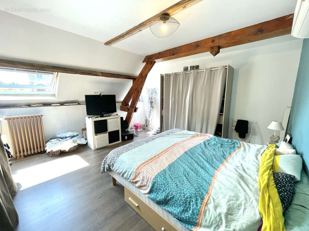 Maison avec beaux volumes - 3 chambres - garage et jardin - photo 13