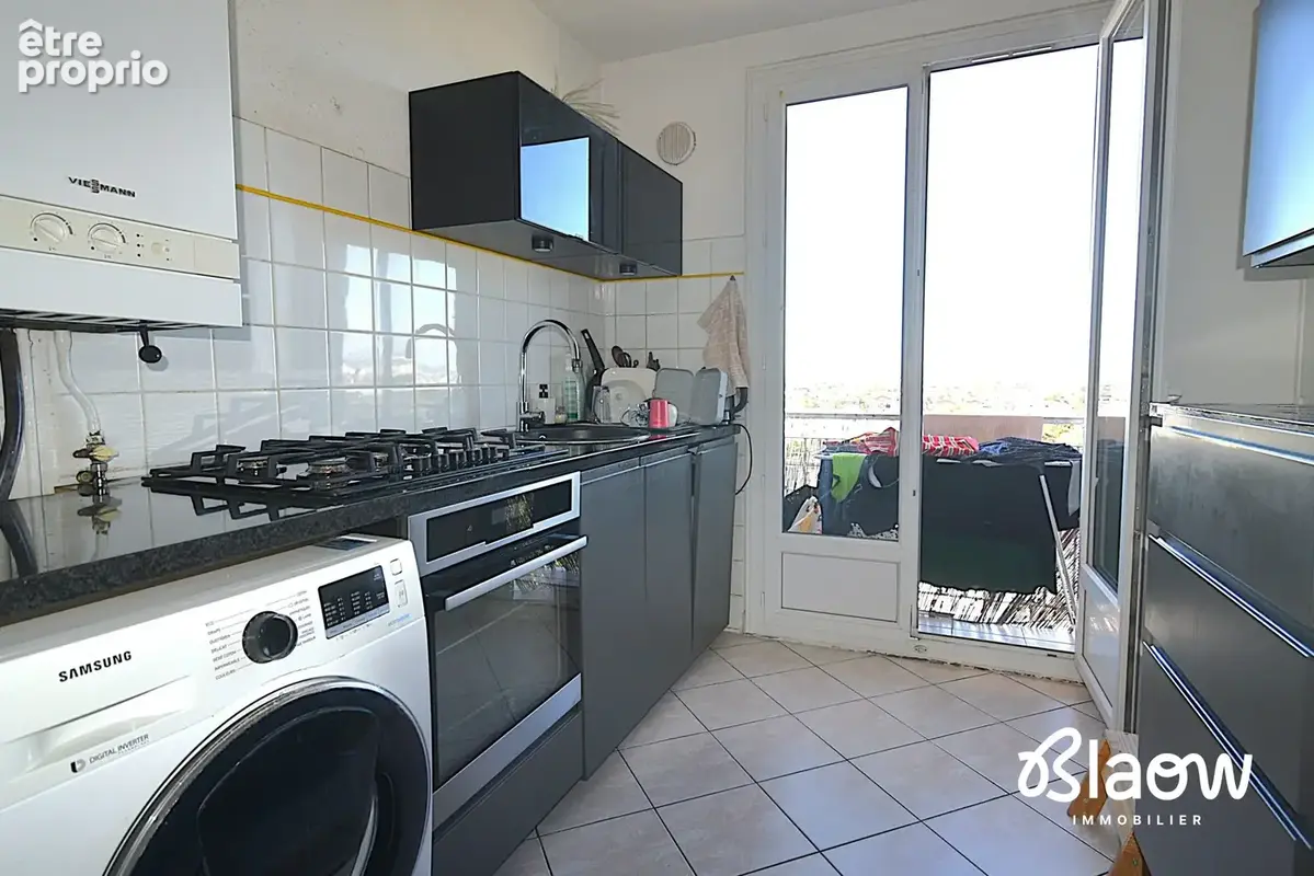 Appartement 3 pièces 56 m² à vendre à Decines-Charpieu (69150) - photo 4