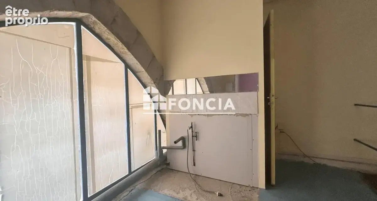 Local de 50.46m2 avec cave en pierre - photo 5