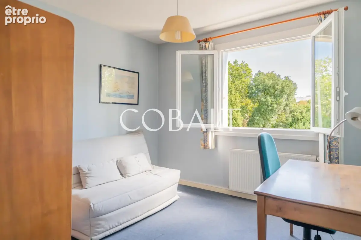 NANTES CANCLAUX   EXCLUSIVITÉ   Appartement T3 de 82 m2 en étage élevé avec balcon, grande cave de 9 m2 et par - photo 6
