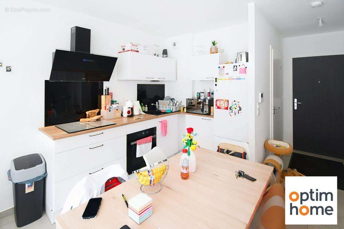 Appartement plain pied 50m2 environ - terrasse - place de parking privative - vendu meuble - photo 4