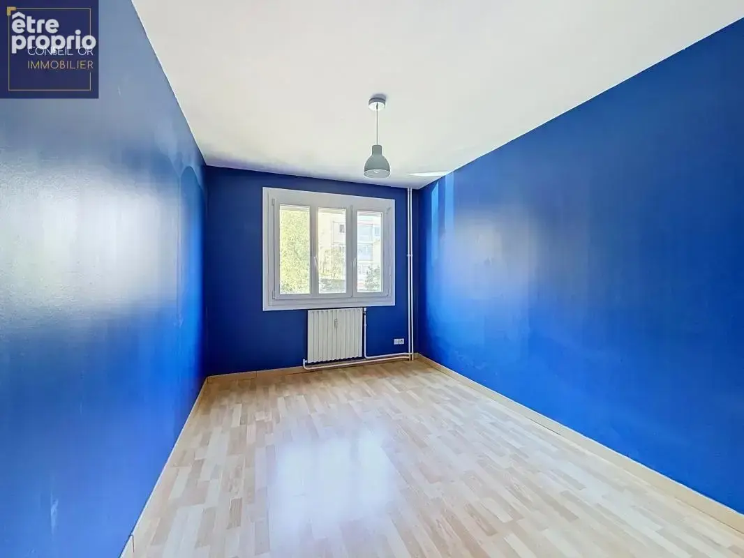 T3 - 75 m² - 2 chambres - balcon - cave et parking collectif - Irigny - photo 7
