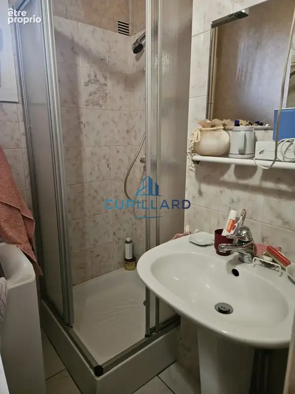 Appartement T4 avec balcon - cave et garage - Vue dégagée - photo 11