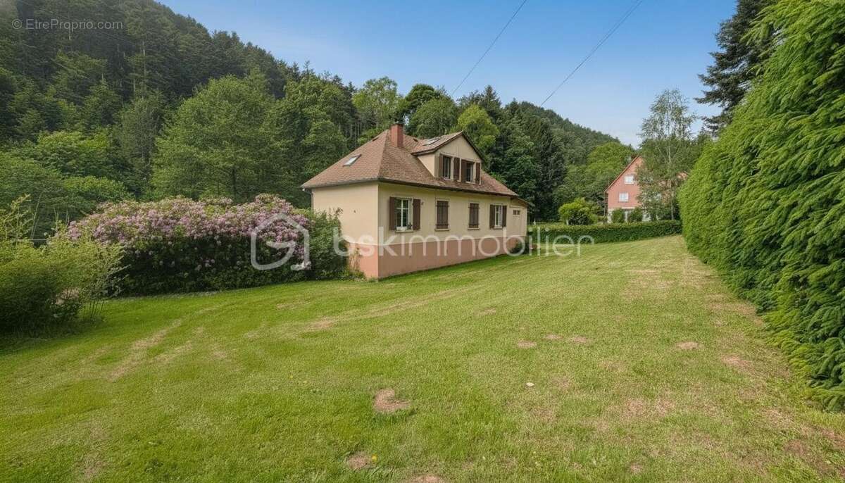 Maison 130m² - 3 chambres - 2 salles de bain - 2 garages sur 23 ares - photo 2