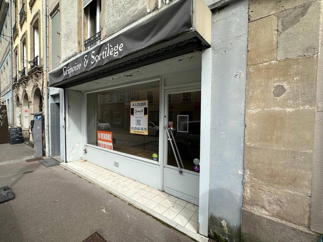Photo 1 - Commerce à REMIREMONT