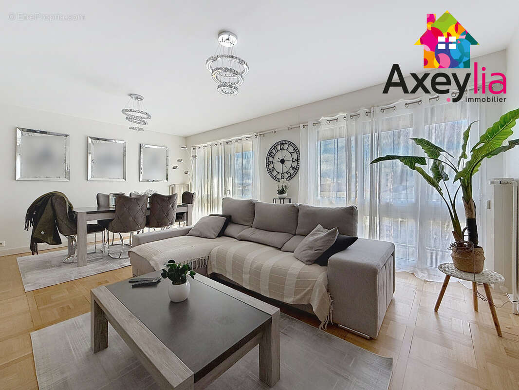 A vendre - roanne centre - proche gare - appartement t5 avec quatre chambres, deux balcons, cave et garage - photo 3