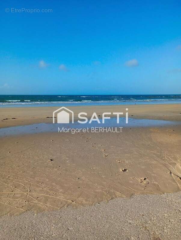 Photo 2 - Maison à URVILLE-NACQUEVILLE