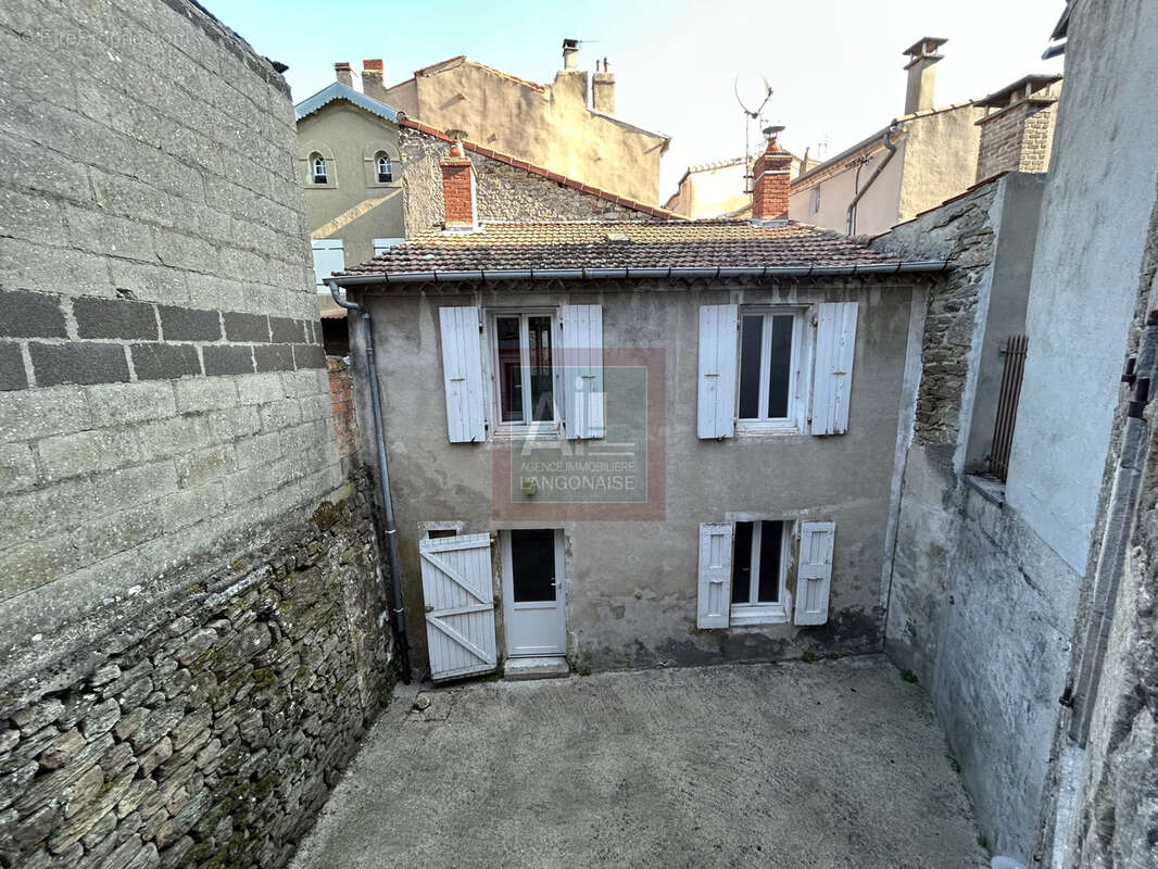 Immeuble commercial et résidentiel avec maison indépendante - photo 2
