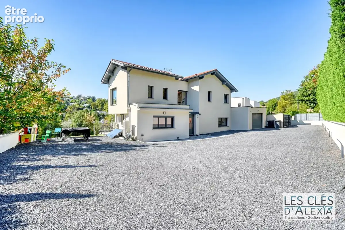 Saint-didier-au-mont-d’or — somptueuse maison contemporaine avec piscine  203 m²  terrain 2 134 m² - photo 24