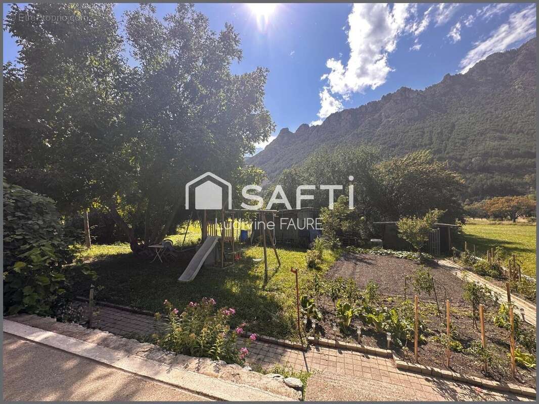 Photo 2 - Maison à LA ROCHE-DE-RAME