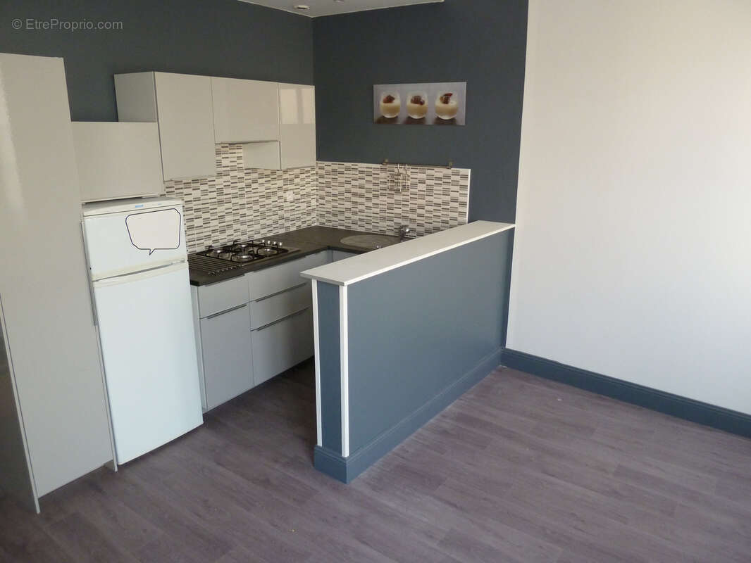 Muret centre ville - Immeuble rénové comprenant 2 T2, 1 studio et un local prfessionnel - photo 8