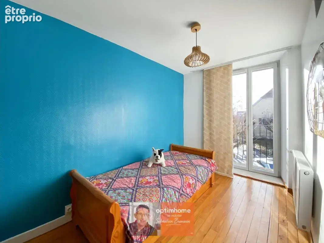 DOLE – Appartement duplex 85 m² – beaux volumes, parking et grande cave - photo 7