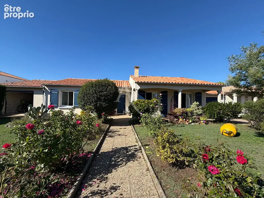 Maison 3 chambres avec véranda, garage, atelier et beau jardin - photo 1