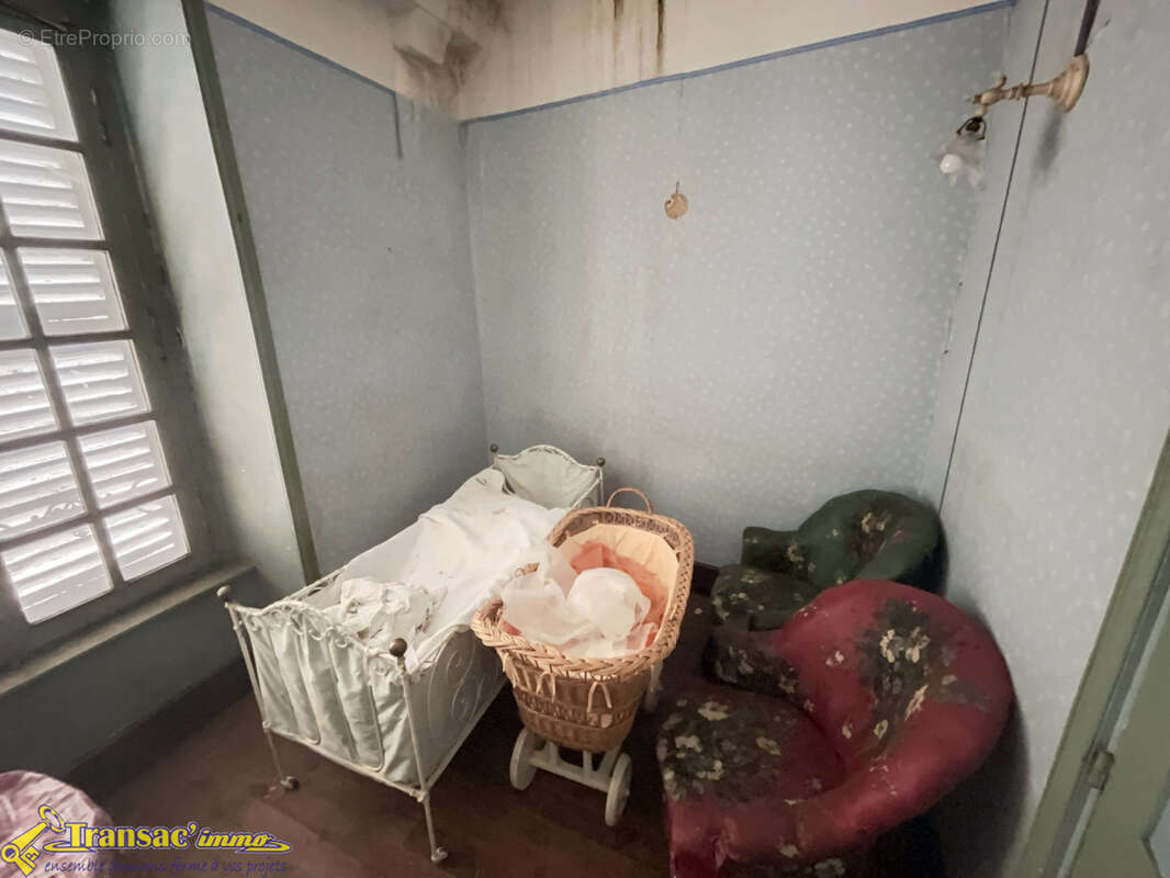 Grande maison de caractère au cœur de Courpière - photo 15