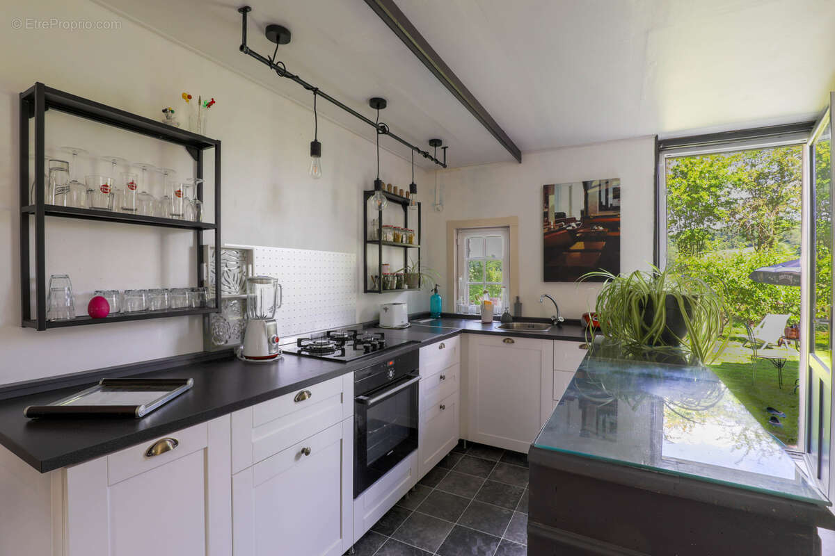 Maison à GUERQUESALLES