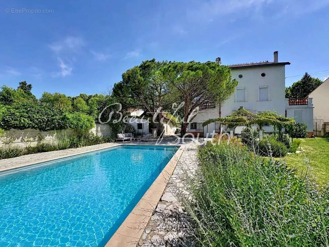 Élégante maison de maître des années 1930 avec jardin paysager et piscine - PRADES - photo 11