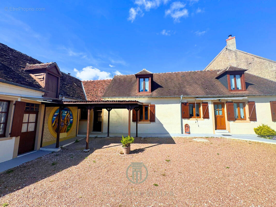 Maison à GARIGNY