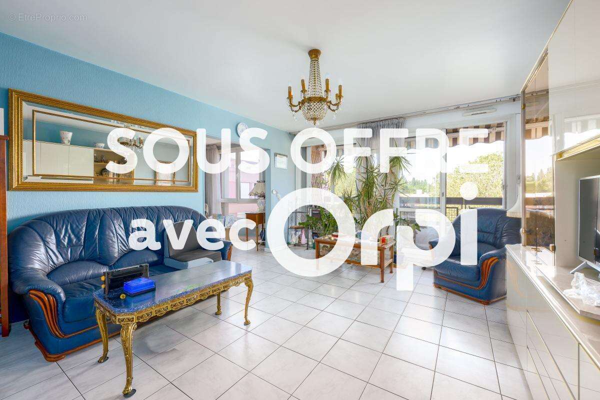 Appartement 5 pièces - 110 m² - balcon - boxes et parking sous-sol - photo 2