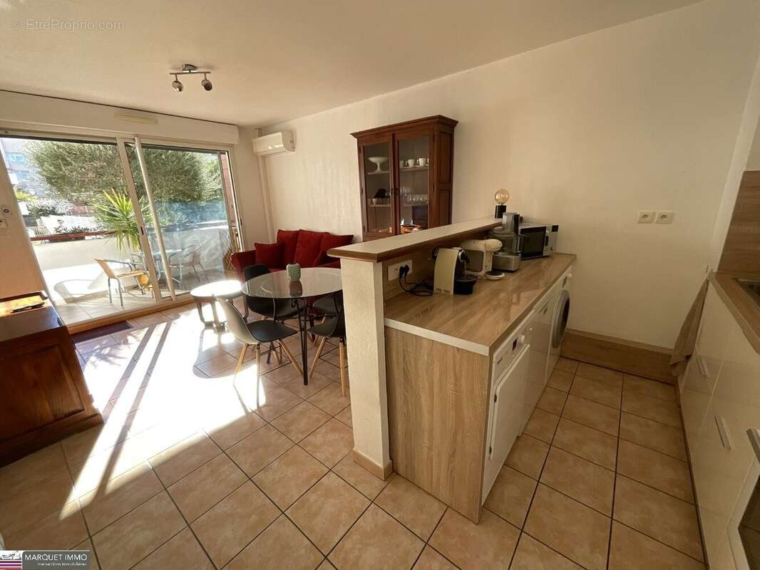 Agréable appartement T3 offrant 51 m² avec terrasse de 6 m² en rez-de-jardin d'une résidence sécurisé avec des espaces verts des - photo 4