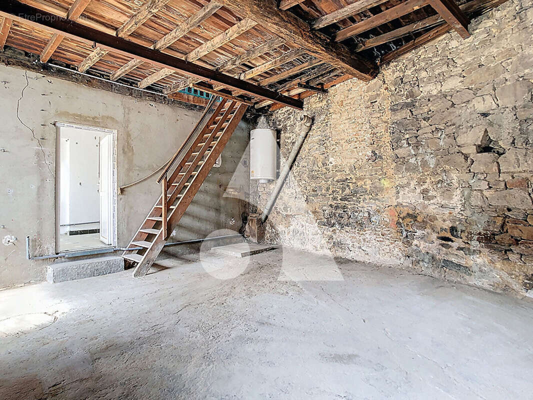 Maison à GREZIEU-LE-MARCHE