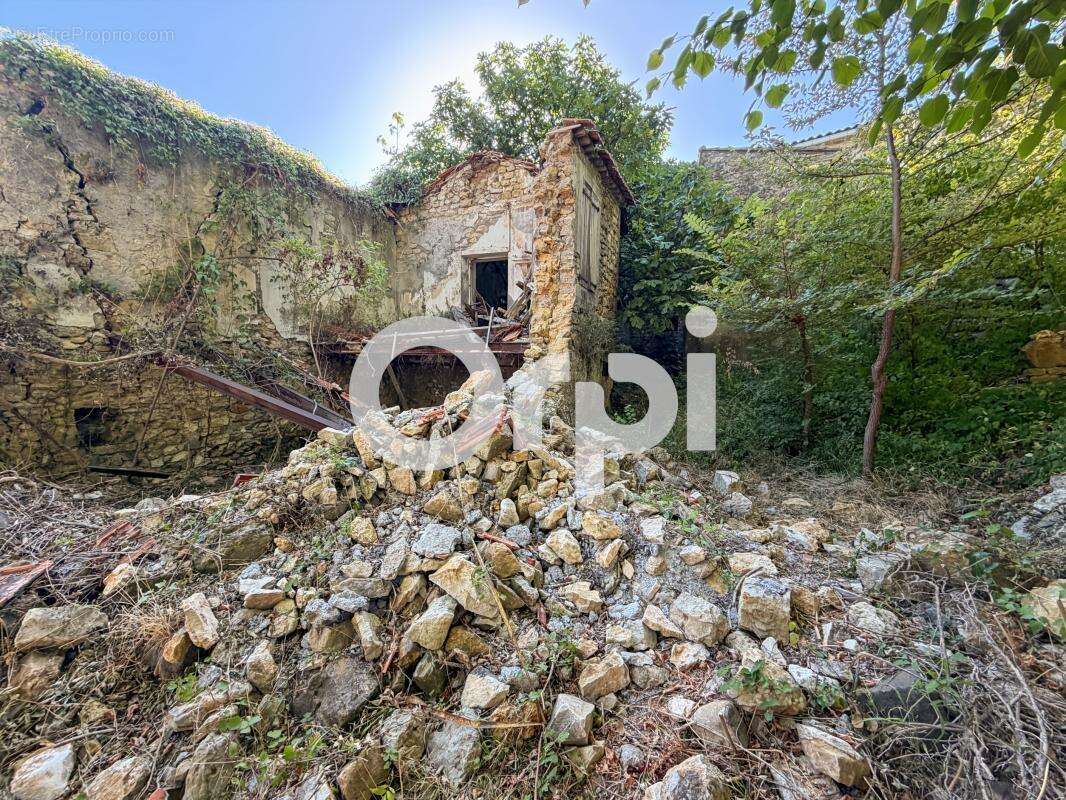 Bâtisse de 1800 sur plus de 2,8 hectares – Allègre-les-Fumades - photo 9