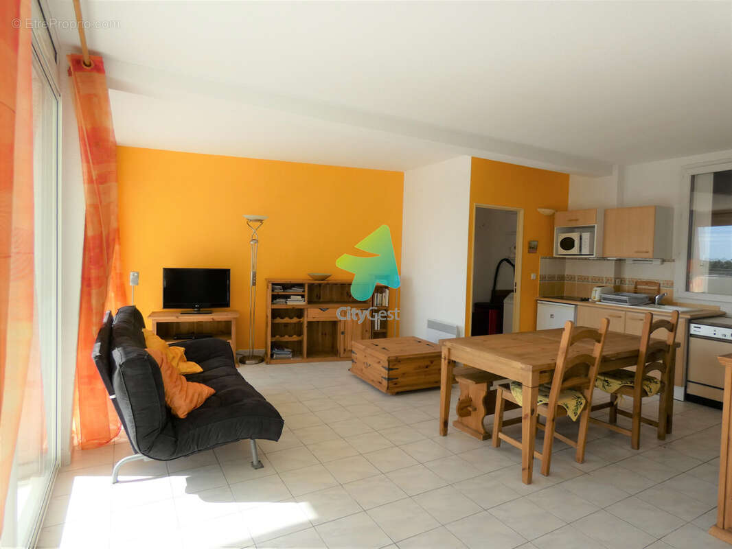 Appartement T3 69.57m2 + Terrasse + Cellier + Parkings - photo 11