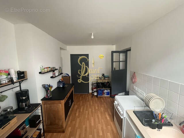 Immeuble de rapport 2 appartements 1 local commercial libre - photo 7