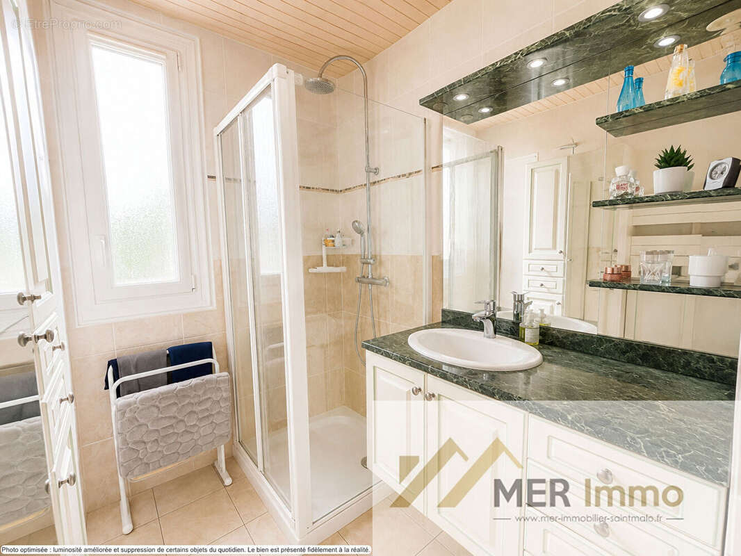 Saint-Malo - Quartier Lorette - Maison d'environ 106 m² avec 4 chambres, jardin clos et grand garage - photo 7