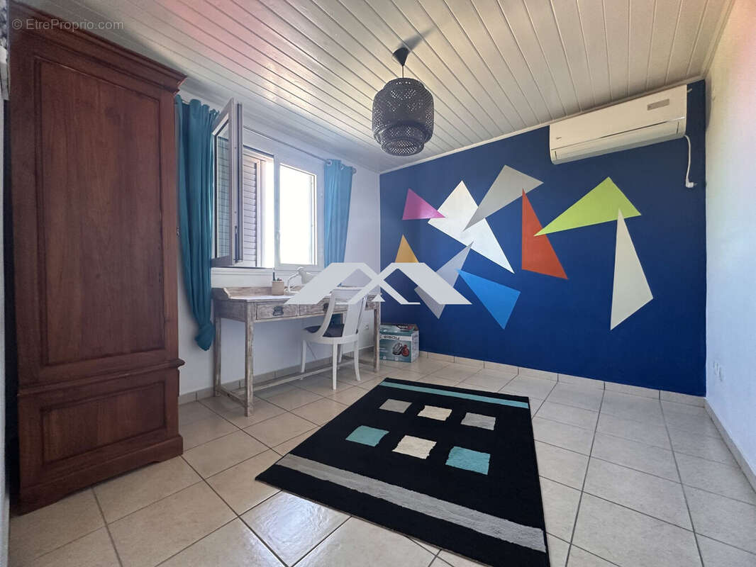 Maison 126 m² à Saint-Joseph  - photo 7