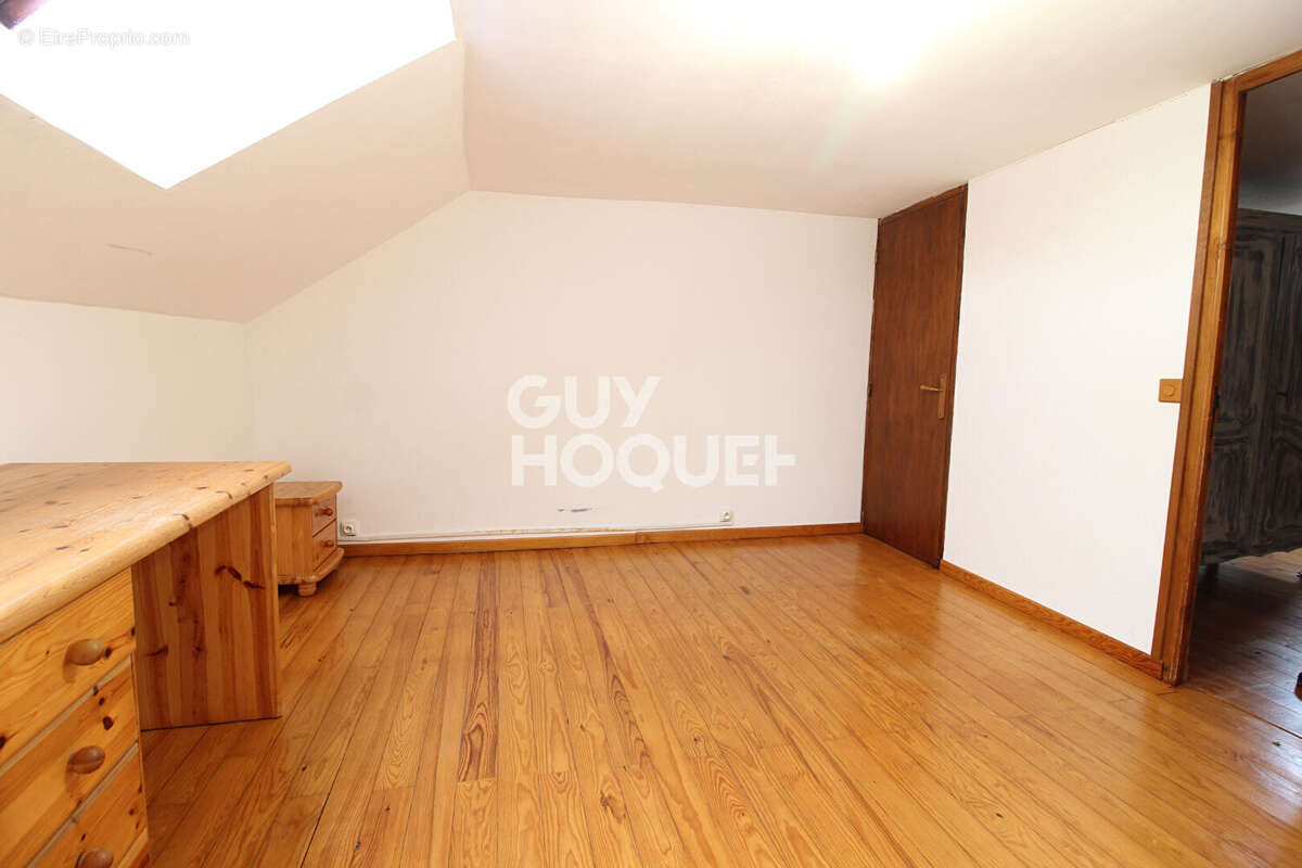 Maison à GUIGNES