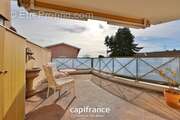 Appartement à SAINT-GENIS-LES-OLLIERES