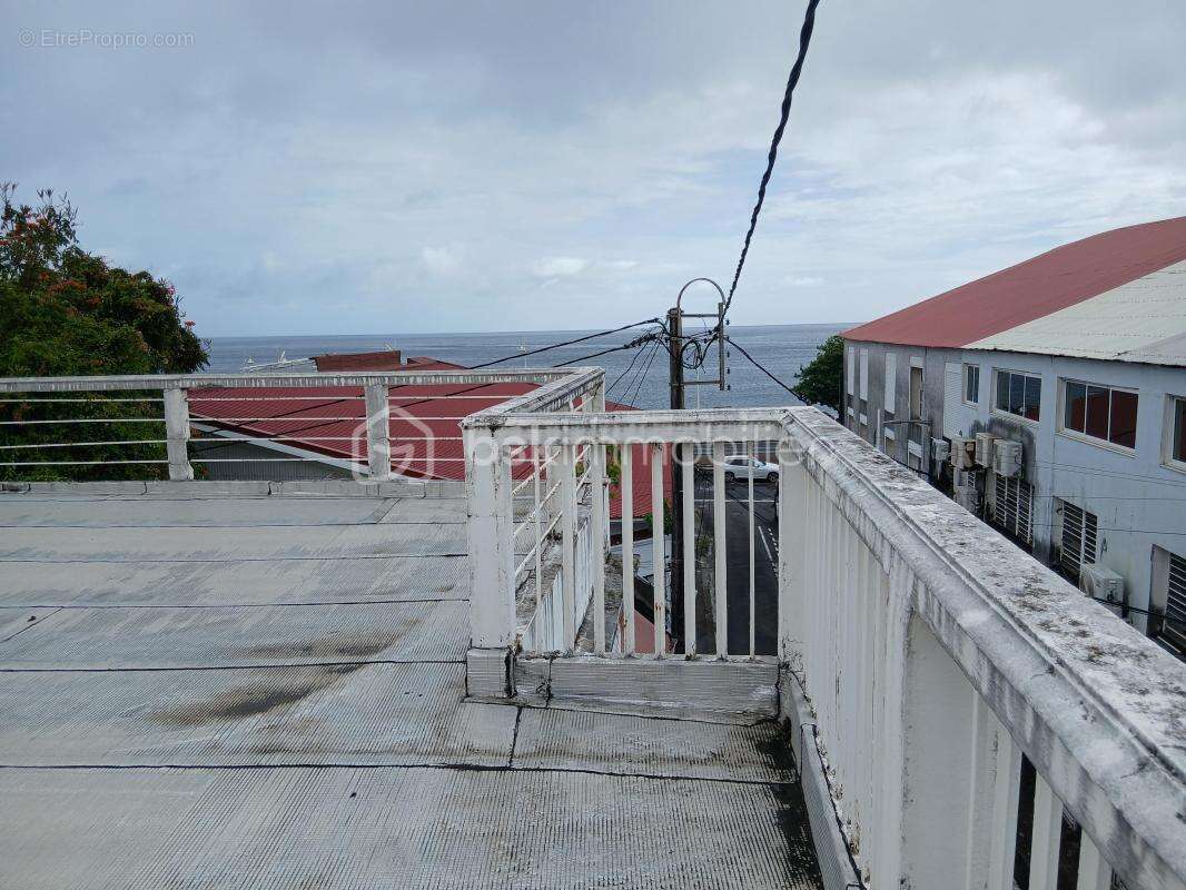 Immeuble d’exception au cœur de Basse-Terre avec rooftop et vue mer - photo 11