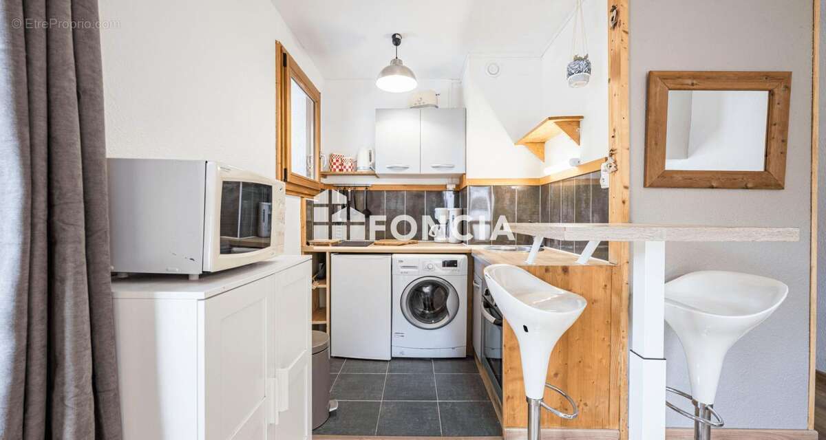 Appartement + terrasse de 31 m2 + garage + cave + casier a skis - photo 3