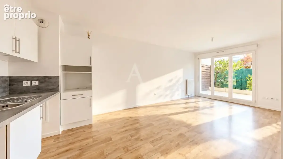 Coup de coeur f3 en rez-de-jardin avec terrasse & jardin ! - photo 3