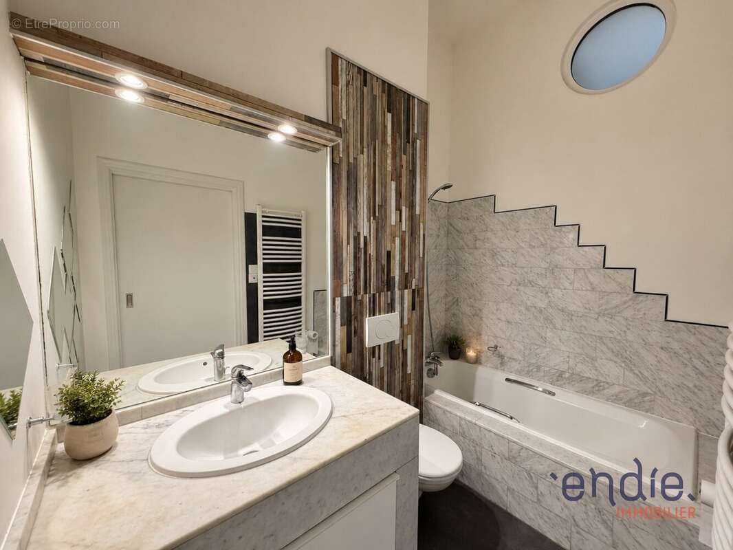 Appartement atypique 4 pièces avec jardin et parking dans un cadre exceptionnel - photo 8